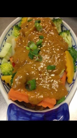 Pra ram long song; steamed mixed veggies and tofu topped peanut sauce vegetarian, vegan  at Pattaya Thai in Hamilton