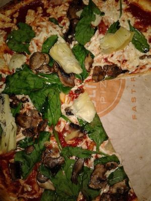 Vegan pizza with spinach, artichoke, and mushrooms at Blaze Pizza in Claremont