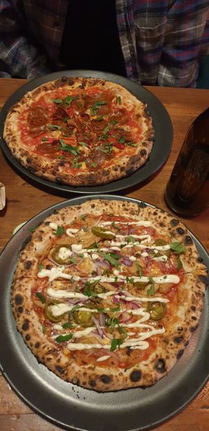 Pepperoni pizza and BBQ chickn pizza at Red Sparrow Pizza in Collingwood