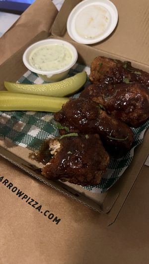 Not wings with bbq sauce and ranch dip. 100% recommend! So good!  at Red Sparrow Pizza in Collingwood