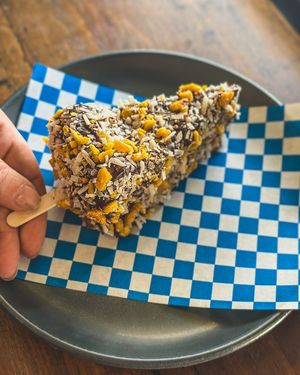 Cheesecake pop with coconut, mango and tajin at Red Sparrow Pizza in Collingwood