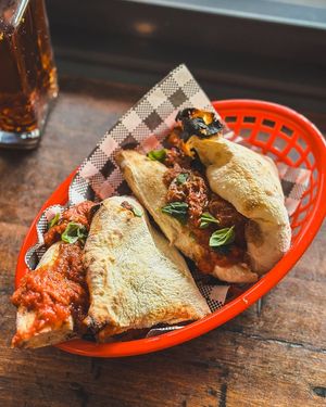 Saturday Sanga with plant based meatball, roasted red capsicum, mozzarella, parmesan, Napoli sauce and basil at Red Sparrow Pizza in Collingwood