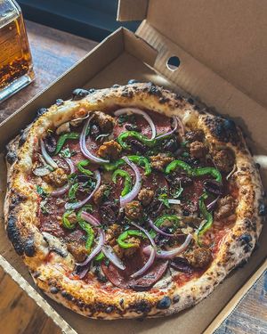 Beyond Supreme: pepperoni, Beyond sausage, mushrooms, olives, green capsicum and onions with tomato and mozzarella at Red Sparrow Pizza in Collingwood
