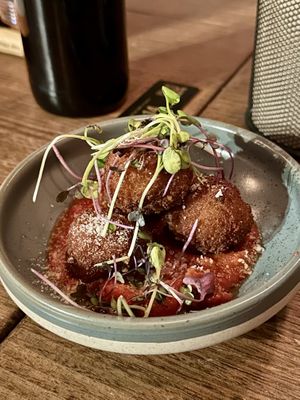 Pumpkin Arancini with Napoli sauce and Parmesan   at Red Sparrow Pizza in Collingwood
