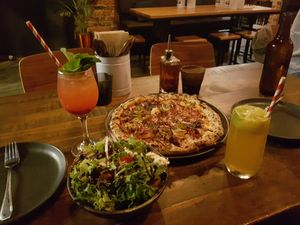 'The Greasy Wheel' - special of the week, Greek salad, and cocktails at Red Sparrow Pizza in Collingwood