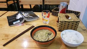 Sauteed eggplant with coconut and rice on the side. at Cay Me - Tamarind Tree in Da Nang