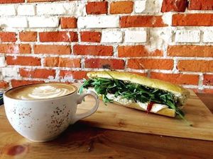 Freshly made sandwiches with mozzarella cheese aside with freshly grinned coffee.  at Brunet Kafe in Warsaw