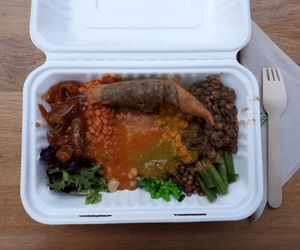 Different types of lentils, okra, beans and salad with spicy sauces at Merkamo Ethiopian in East London