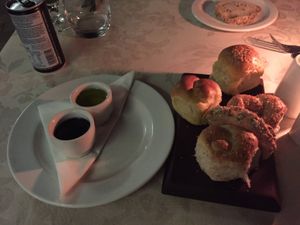 Vegan bread with olive oil and vinegar  at The Cassia Restaurant in Victoria Falls