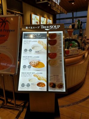 Menu. Each item has a list of allergens. at HND - True Soup in Tokyo