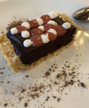 raw chocolate treat with strawberry sauce  at Lila in Sarasota