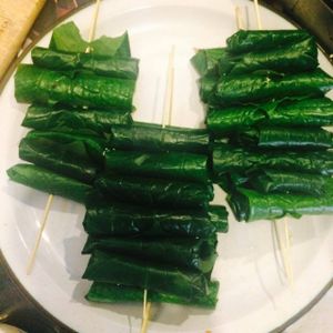 Tofu-Shiitake rolls wraped and grilled in basil leave.  at Thuc Duong Bao An - Bao An Macrobiotic in Da Nang