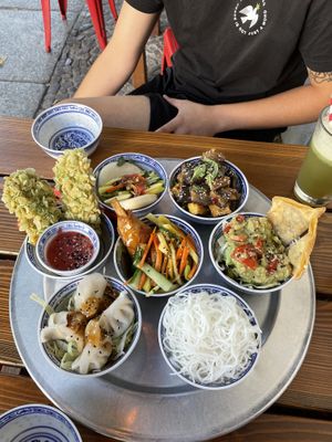 The seitan wings , the tofu with eggplant and the dumplings were our favourite:) at 1990 Vegan Living in Berlin