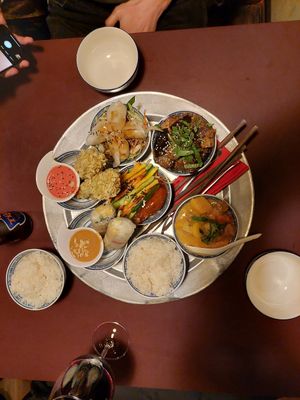 Silken tofu coated with flakes (#3), eggplant, shiitake, tofu (#6), marinated seitan (#10), rice paper rolls (#14), dumplings (#16), red curry (#17) + 2x extra rice (36€) at 1990 Vegan Living in Berlin