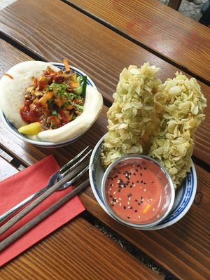 Bun Bao Taco and Com Chien (soft tofu with crispy green rice flakes) at 1990 Vegan Living in Berlin