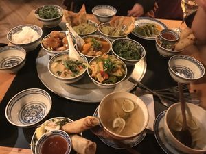 Sharing small dishes with friends at 1990 Vegan Living in Berlin