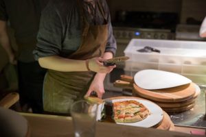 Pizza with various cheeses. at Casa La Familia in Vilnius