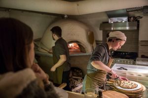 Authentic wood burning clay stove @CasaLaFamilia at Casa La Familia in Vilnius