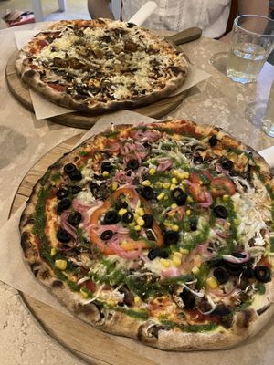 Vegetarian Classic pizza (front) and Forest pizza  at Casa La Familia in Vilnius