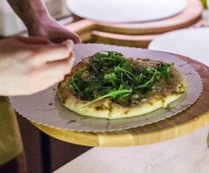 PIzza with fresh herbs. at Casa La Familia in Vilnius