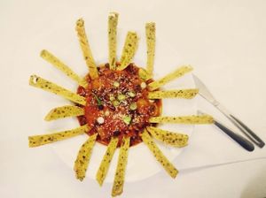 Sausage, passata, black beans and tumeric bread, all homemade from scratch by Chef Mauro at Vegan Yes - Nag's Head Market in North London