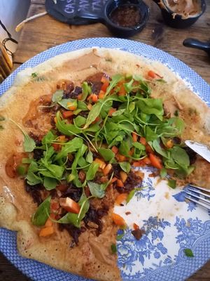 "Create your own" peanut butter, sweet chilli sauce, caremelised onion, peppers & some of the side salad on top at Double Dutch Pancake House in York