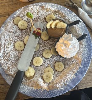 Half ban half biscuit with whipped cream  at Double Dutch Pancake House in York