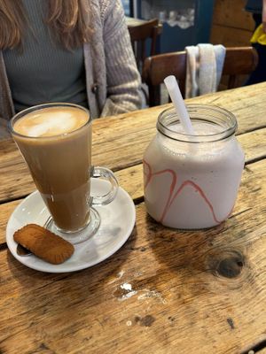 Latte with Oat Milk (left) and Strawberry Milkshake (right) at Double Dutch Pancake House in York