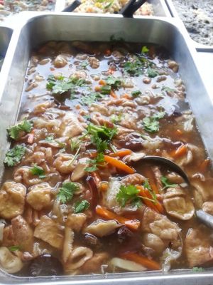tofu and mushrooms in red gravy at Pang Vegetarian in Udon Thani