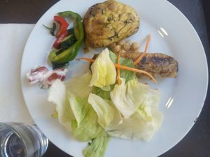 Tofu (the round food on top of the plate) was tasty and fluffy at Veganland - Karlovo Namesti in Prague