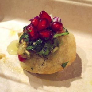 Our little balls of bliss ~ pani puri
Fried chapatti balls, filled with spiced potato, home-made chutneys, chickpeas, red onion and topped with fresh pomegranate and chickpea noodles. at Babaji's Kitchen in Belgrave