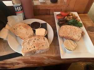 Toast and spreads on the left/  vegan breakfast   at Sandfly Cafe in Te Anau