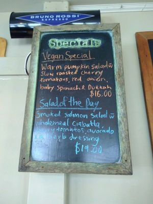 Vegan special: warm pumpkin salad w/ slow roasted cherry tomatoes, red onion, baby spinach & dukkah for $16 at Sandfly Cafe in Te Anau