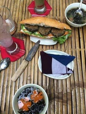 baguette sandwich with banana blossom patty & peanut sauce - 30k! KOLO goes no-straw and offers damped cloths in place of tissue paper too at KOLO in Hoi An