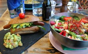 Hot dog and salad.  at Organic Cafe in Fuengirola