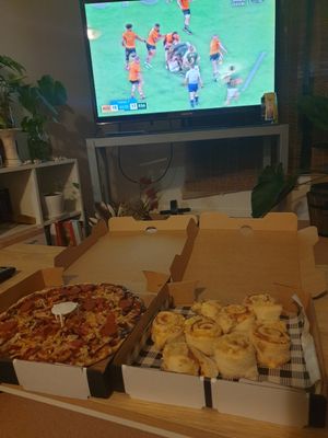 Pizza and ham and garlic scrolls at Harry's Gourmet Pizza in Adamstown