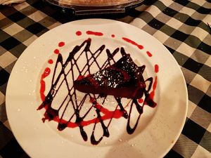 The flourless vegan chocolate cake. 🍽️😋  at Pia's Trattoria in Gulfport