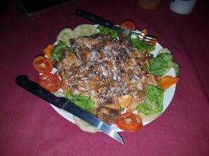 Pasta with cheese and mushrooms. Incredibly good and big, firm nice pasta, great sauce and fresh vegetable aside. 10/10 at Maya's Organic Garden in Arambol