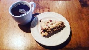 Raisin, cranberry scone and coffee with soy  at Hideaway Bakery in Eugene