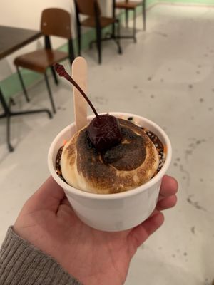 Vegan sundae with oat milk based peanut butter swirl ice cream, choc magic coat, spooky Halloween sprinkles, marshmallow fluff and a cherry. 😍 at Charm School in Richmond