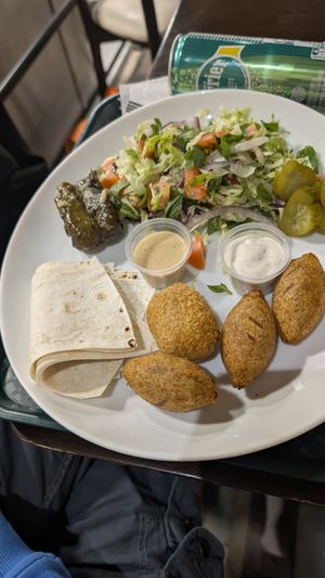 Kibe and stuffed köfte with panko. Stuffed vine leavest at Cigköftem in Lyon