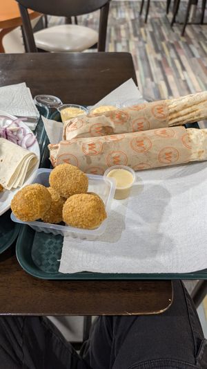 Rolled lamacun at Cigköftem in Lyon