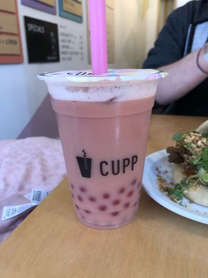 Rose milk tea with strawberry bubbles (oat milk)  at CUPP Bubble Tea in Bristol