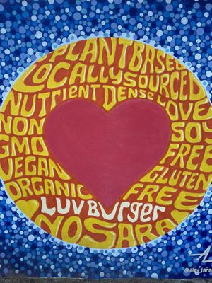 Sign outside at Luv Burger in Nosara