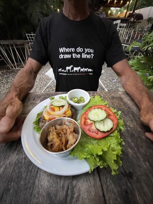 OnIon Lovers Burger with lettuce bun and extra jalapeños…Where do you draw the line? at Luv Burger in Nosara