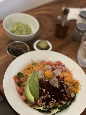 Big Green Salad. I like to add sautéed mushrooms, pickles, and guacamole to my salad (see sides in the background). I L❤️VE this salad!😍😍😍 at Luv Burger in Nosara