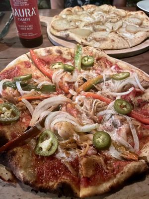 Jackfruit pizza and potato pizza at Luv Burger in Nosara