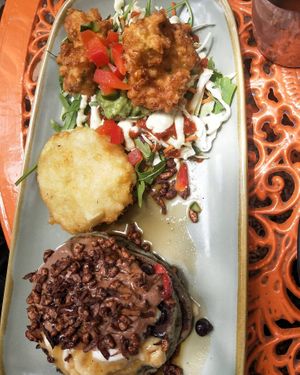 The Ying and yang, banana blueberry pancakes and corn fritter tacos done gft at Komuniti in Long Jetty