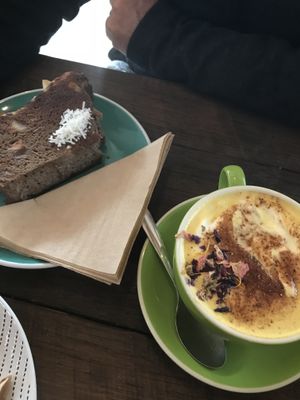 Turmeric latte and toasted banana bread   at Komuniti in Long Jetty