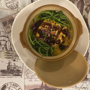 Delicious tofu claypot rice! at Raw Chefs Cafe in Kowloon